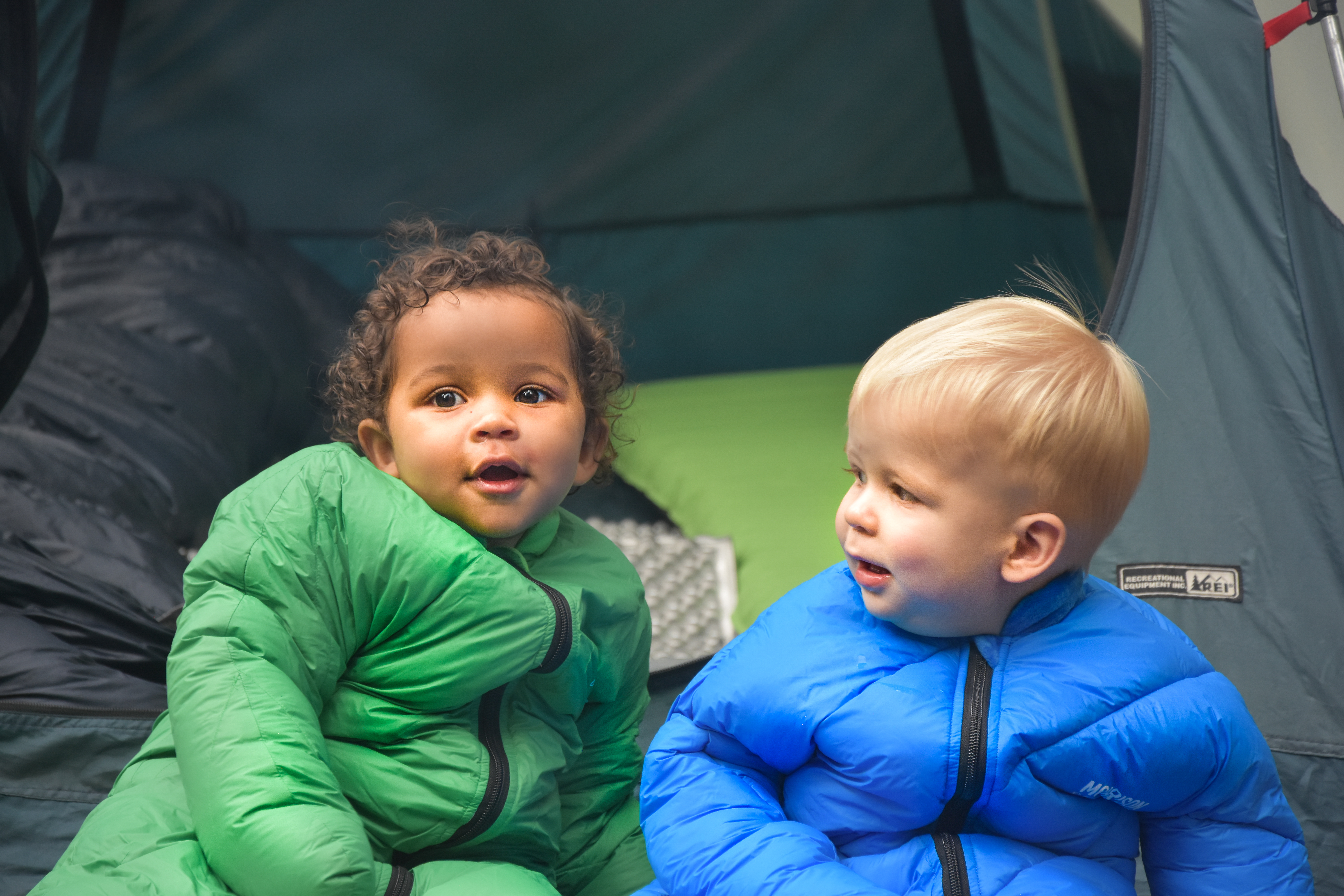 Two babies in Morrison Outdoors sleeping bags